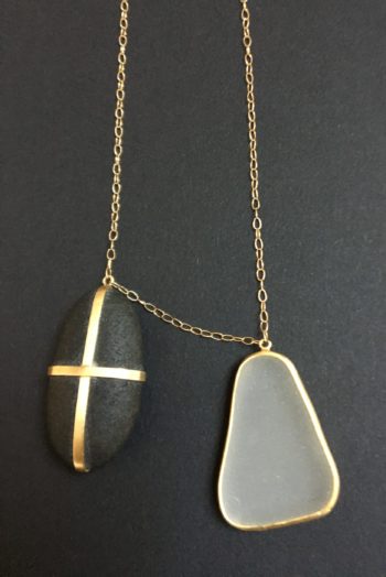 Black pebble and clear glass pendant